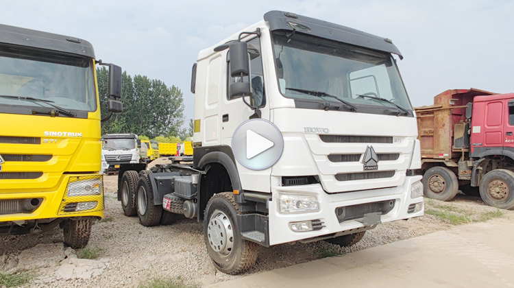 Video of Used Howo 6x4 Tractor The video slowly advanced, and a howo trucks for sale in Tanzania came into view. The streamlined body lines demonstrate the perfect combination of strength and beauty. The eye catching brand logo on the front of the used howo 6x4 tractor shines brightly, demonstrating its extraordinary quality. The solid body structure demonstrates excellent durability and stability, making howo trucks for sale in Tanzania undoubtedly a trustworthy transportation tool.    Used howo 6x4 tractor | howo trucks for sale in Tanzania Dar Es Salaam